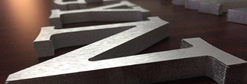 Custom cut-out metal lettering